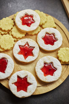 Classic Linzer Christmas Cookies with raspberry or strawberry jam