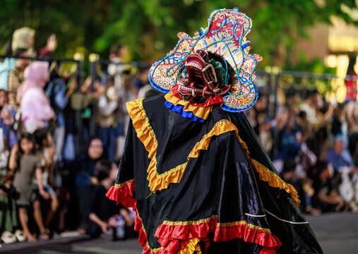 Surabaya, Java Timur, Indonesia - May 16, 2026 - A performer in animal costume at the Surabaya Vaganza 2026 nighttime parade in Surabaya