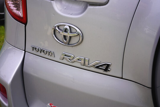 SAINT-AIGNAN, FRANCE - MAY 14, 2026: Rear emblem and logo of a silver Toyota RAV4 car