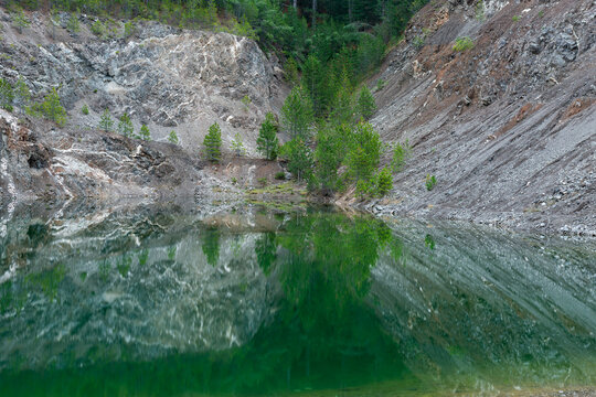 Tavnicko lake near Zlatibor in southern Serbia, clear and calm water in former magnesite mine
