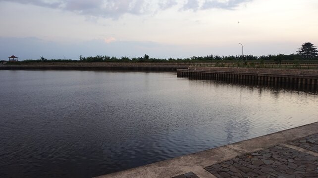 murky, flowing irrigation river water, landscape dam water 