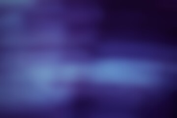 Obraz premium Abstract blue light streaks with dark background creating