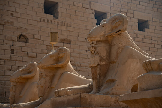 Karnak temple ram headed sphinxes ancient Egypt architecture landscape horizontal.
