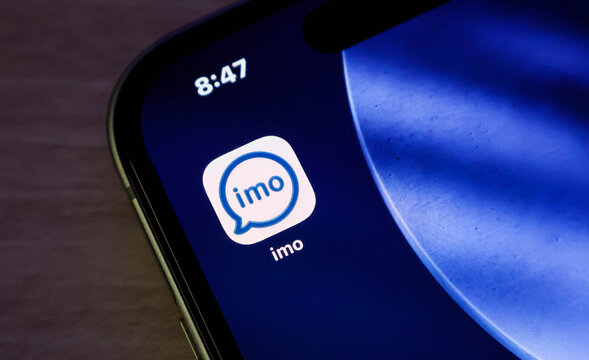 Closeup of the imo instant messaging app icon on a smartphone screen