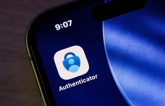 Closeup of microsoft authenticator app icon on a smartphone screen, representing twofactor authentication and cybersecurity concepts