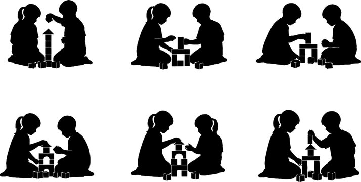 Silhouette of children playing together with blocks on floor.
