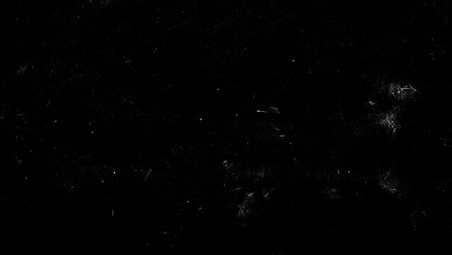 Sparse white dust and light scratches on deep black background representing outer space stars or vintage film grain overlay for creative photography post processing work.