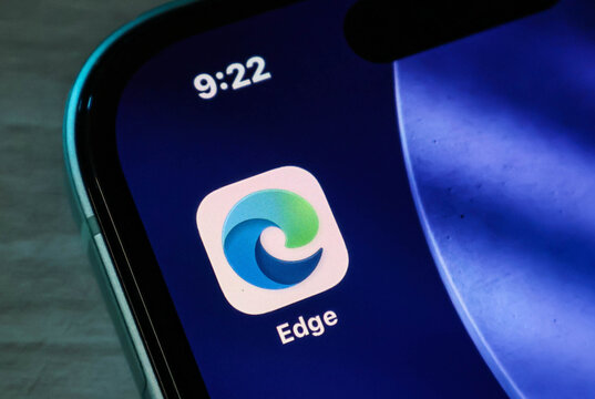 Closeup of the microsoft edge web browser app icon displayed on a modern smartphone screen