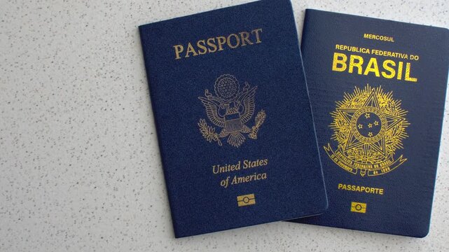 Brazilian passport alongside the American passport: symbols of global connection and international travel.