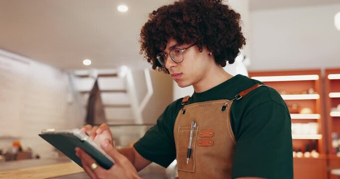 Thinking, owner and man at restaurant with tablet, menu development and planning for small business. Research food trend, technology and entrepreneur in kitchen, recipe creation and culinary ideas.