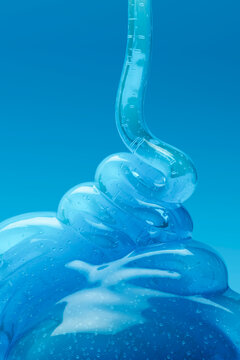 3D blue gel flow with transparent bubbles and glossy folds