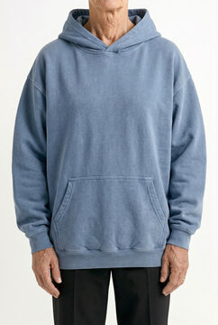 Light blue pullover hoodie mockup. Oversized hooded sweatshirt with pocket on model, minimalist casual style apparel presentation, blank cotton clothing template for design display