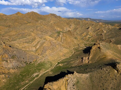 Dry, hilly landscape with sparse vegetation and expansive sky, aerial view, mountains on D70 and D80, Tuzluca, Igdir Province, Iğdır, Eastern Anatolia, Anatolia, Turkey
