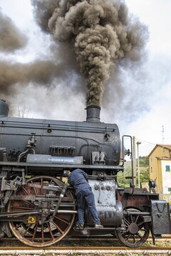 Maintenance work on the historic steam locomotive, Treno Natura, Val dOrcia, Tuscany, Italy