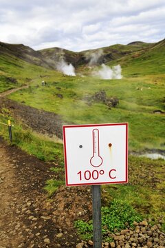 Sign with inscription 100 degrees Celsius, warning, boiling hot water, steaming valley, bathing place Reykjadalur, Hverager&eth;i, Hveragerdi, Golden Circle, ring road, Iceland