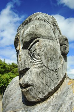Traditional wood carved mask in the Te Puia Maori Cultural Center, Roturura, North Island, New Zealand