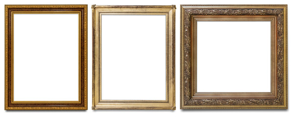Fototapeta premium Three ornate, empty picture frames in gold and bronze tones.
