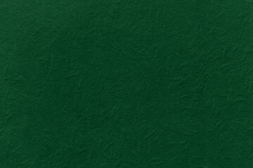 Rich green textured paper background with subtle creases and folds. © Rawpixel.com