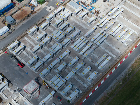 Aerial view of HS2 Concrete Segment Manufacturing and Production Site with rows of precast concrete segments and machinery in Birmingham, England, United Kingdom.