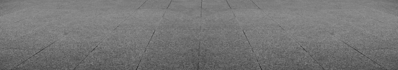 Fototapeta premium empty stone floor top in perspective. grey tile floor background in perspective view. line. empty copy space stone street. pavement. Granite outdoor tiled floor. gray granite. Marble texture