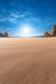 Golden sandy landscape under a bright sun, with distant rocky formations and a clear blue sky, creating a serene and tranquil atmosphere perfect for nature-related themes,