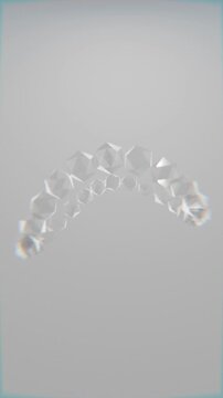 looping 3d geometric icospheres on solid colour background, abstract 3d looping background wallpaper