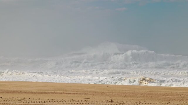 Big waves crushing in winter season in Nazare, Portugal
