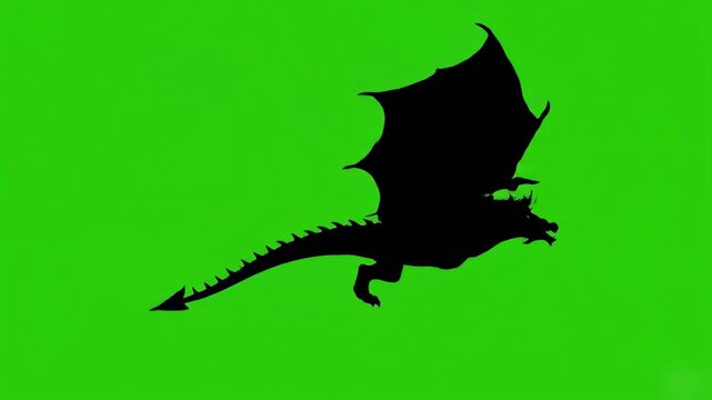 Black Silhouette of a Flying Dragon with Large Wings Isolated on Chroma Key Green Screen Background