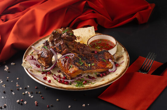 roasted lamb rib, grilled over coals. Menu for a Georgian restaurant
