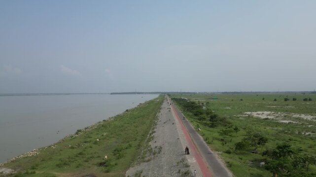 Wide drone view of Jamuna River and surrounding landscape Bangladesh 4K