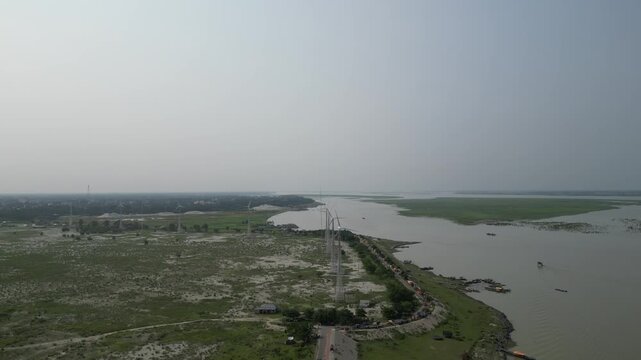 Wide drone view of Jamuna River and surrounding landscape Bangladesh 4K
