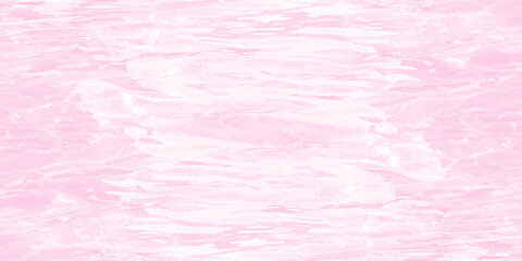 Fototapeta premium Pink water surface background with gentle ripples and soft sunlight reflections creating a dreamy pastel texture