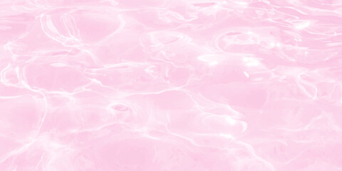Fototapeta premium Pink water surface background with gentle ripples and soft sunlight reflections creating a dreamy pastel texture