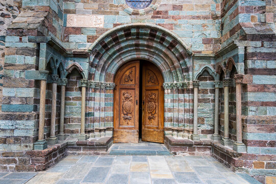Finely carved wooden entrance door of the abbey church of the Sacra di San Michele