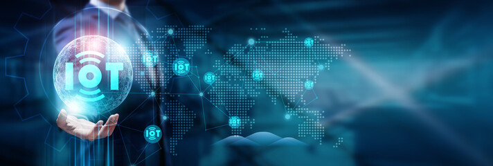 Hand touching a global network, connecting devices through the Internet of Things (IoT), shaping a futuristic world with seamless communication, smart technology, and boundless connectivity. © Gs