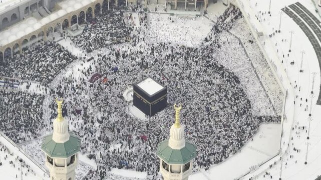 Muslim Pilgrims Performing Tawaf Around the Holy Kaaba in Mecca, Saudi Arabia, From an Aerial View