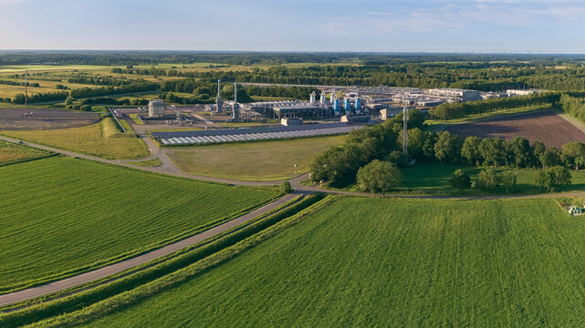 Aerial view of the primary natural gas storage facility from the NAM joint venture near Norg surrounded by solar panels and green fields Langelo, Drenthe, Netherlands.