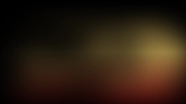 Animation abstract soft gradient light leaks loop motion background on black background. Blurry abstract background with orange glow.