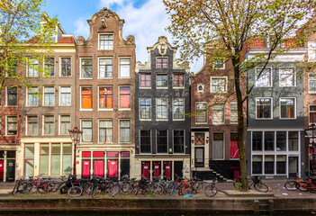 Fototapeta premium Traditional Dutch architecture in Red quarter of Amsterdam, Netherlands