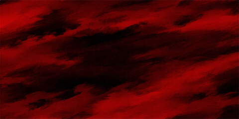 Crimson clouds swirl in a dramatic, dark sky, creating an ominous and visually striking atmospheric backdrop, evoking a sense of intense emotion and raw power. © jaduuu