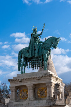 Statue of St. Stephen I of Hungary or King Saint Stephen, first Christian king of Hungary, next to Fisherman`s Bastion in Buda Castle, Budapest. Vertical image