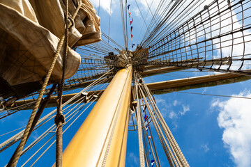 Sailboat Mast and Rigging Against a Blue Sky © willbrasil