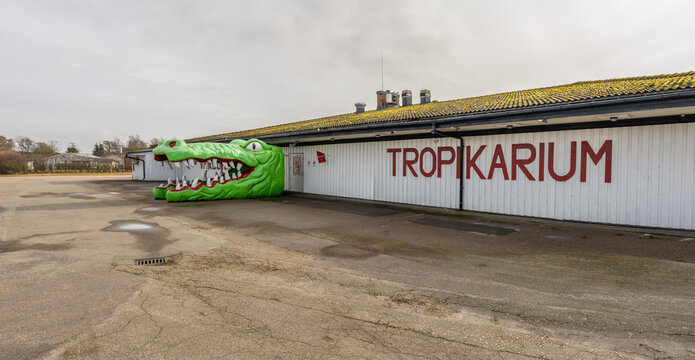 Varberg, Sweden - March 28 2026: Wide panoramic view of closed tropical attraction with crocodile entrance and empty lot.