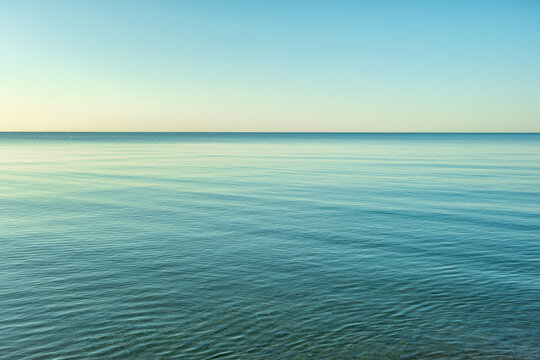 panoramic view to calm sea in soft sun light with nobody and with copy space