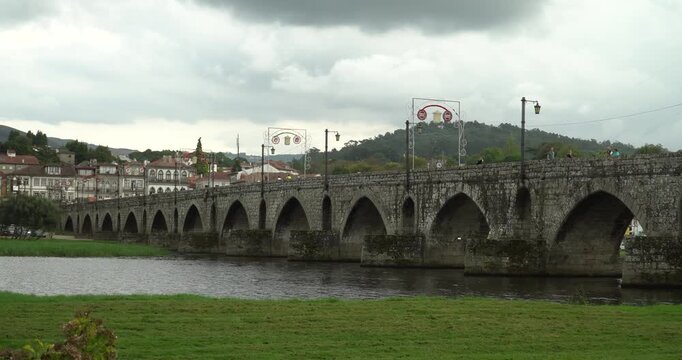 the famous Ponte de Lima (also known as Ponte Romana e Medieval) in the city of the same name in Portugal. It crosses the Lima River and is considered one of the most important landmarks of the Minho 