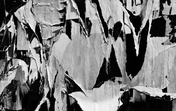 Old ripped torn black and white fly posters textures backgrounds grunge creased crumpled paper vintage collage placards empty space for text	