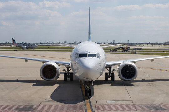 Chicago, IL, USA - Aug 31, 2025: An incoming aircraft, a Boeing 737 Max 9, approaching to its parking gate at Chicago's O'Hare International Airport (ORD).
