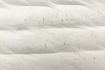 Obraz premium Delicious brie cheese as background, top view