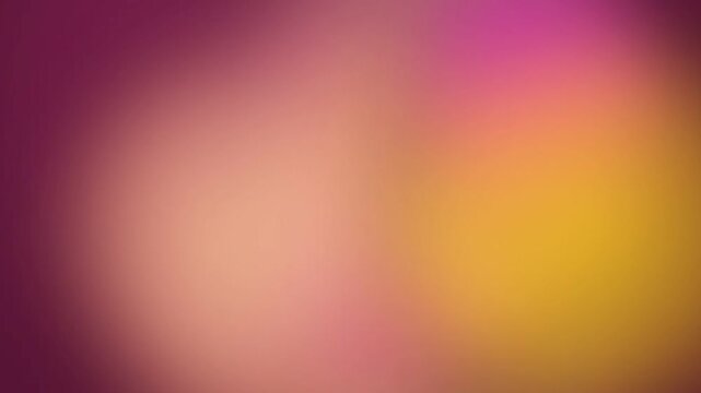 A soft diffusion of vibrant magenta, warm peach, and golden yellow hues blends seamlessly across the frame, creating an abstract gradient composition suitable for various design applications.