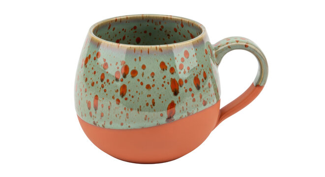 Handcrafted ceramic mug with speckled green and terracotta two-tone design